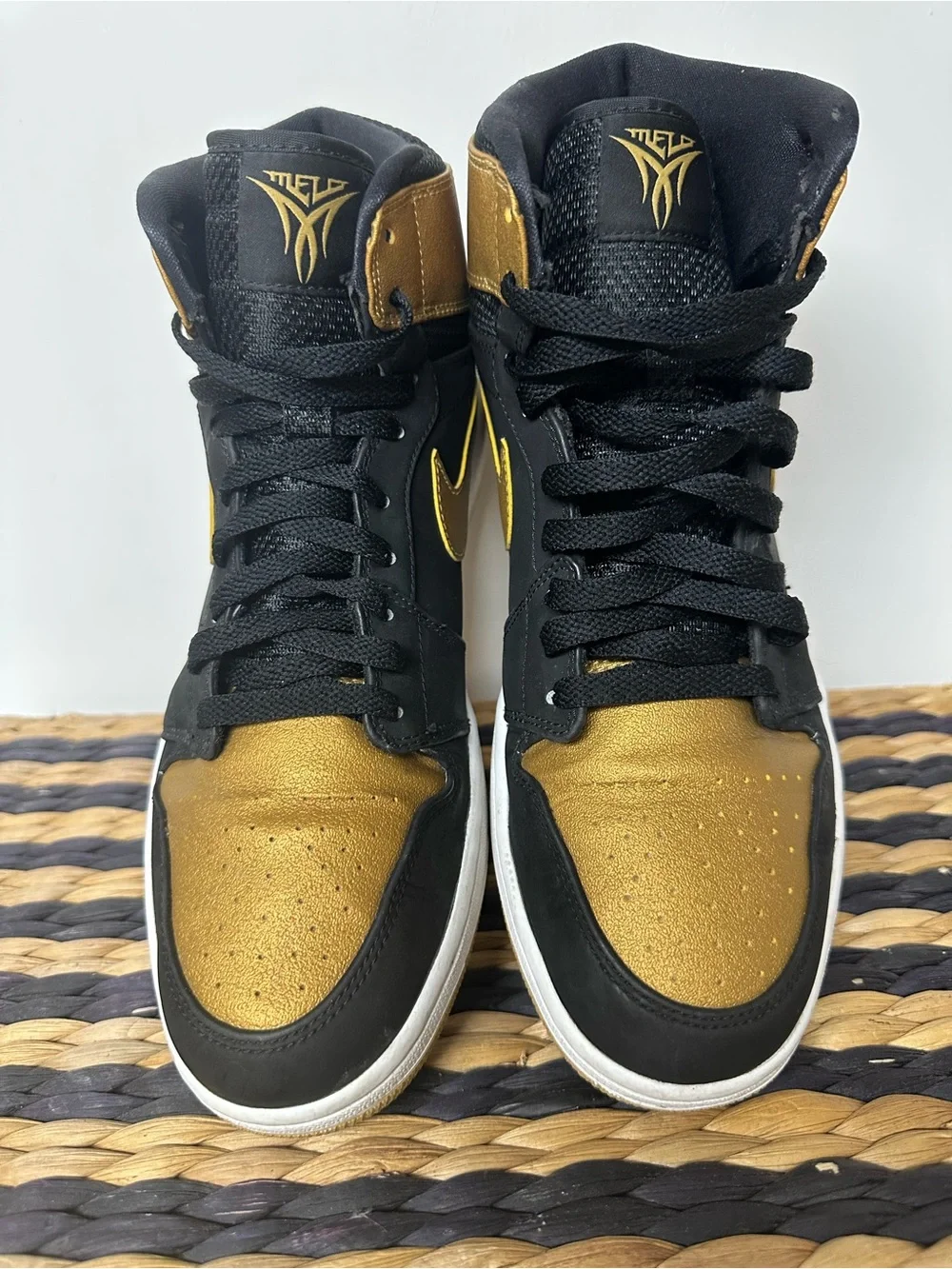 Jordan 1 High-Top Sneakers in Black and Gold